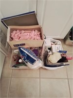 2 boxes of misc bathroom supplies