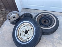 two 15" tires and 4 rims