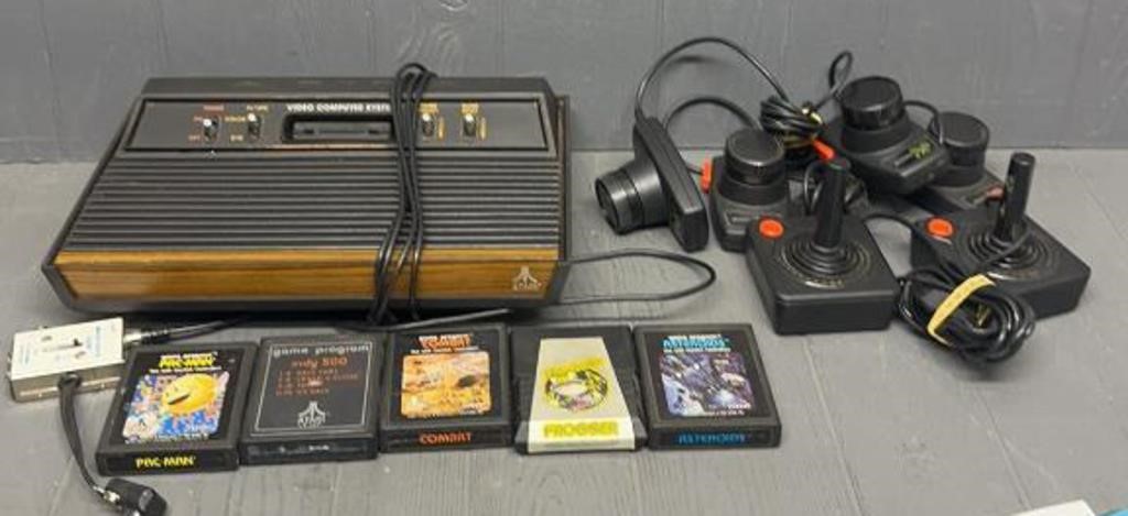 Atari Console w/ (5) Games - Joysticks & Paddles