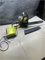 Working Ryobi 12" 40 V electric chainsaw
