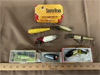 Wooden plugs and lures, plus two empty boxes