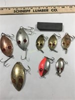 Red eye spoon fishing lures, sharpening stone