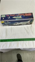 Hess toy truck and space shuttle with satellite.