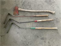 Three grass whips and axe.  One lot. Axe has rust.