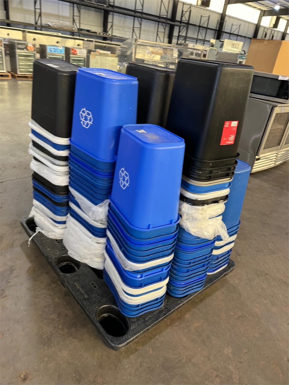 Pallet of office trash cans
