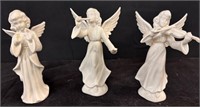 3 White Angel statues