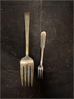 Large serving fork, small olive fork