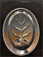 Silver-colored decorative tray with tree detail