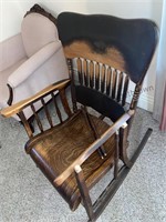 Antique rocking chair in need of repair