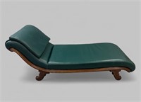 ANTIQUE LEATHER UPHOLSTERED CHAISE LOUNGE