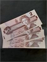 Three 1986 Uncirculated $2. Canadian Bank Notes