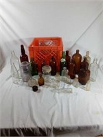 Orange milk crate and vintage collectible glass