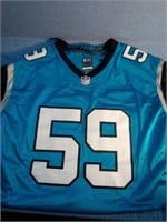 A NFL jursey great condition still has tag size