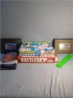 A board game lot that includes a loom elastic