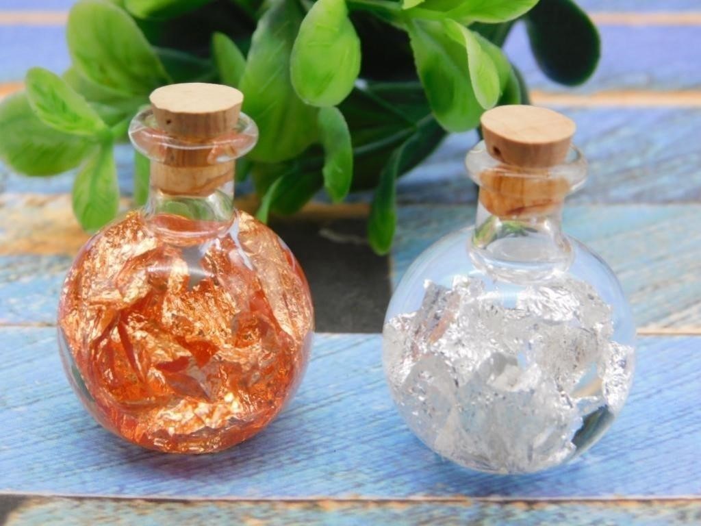 GOLD AND COPPER FLAKES IN BOTTLES ROCK STONE LAPID