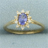 Tanzanite and Diamond Halo Ring in 14k Yellow Gold