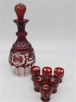 7 PIECE RUBY CUT DECANTER SET 13IN TALL CLEAN