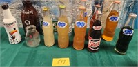 11 - ASSORTED COLLECTIBLE SODA BOTTLES