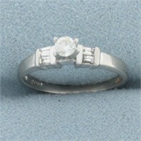 Round and Baguette Diamond Engagement Ring in Plat