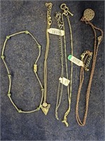 LOT NECKLACES - TOP RIGHT SIDE OF DISPLAY STAND