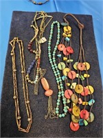 LOT NECKLACES - TOP LEFT SIDE OF DISPLAY STAND