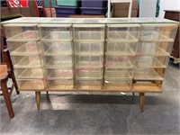 Mid-century haberdashery cabinet on legs