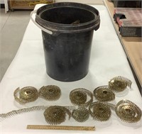 Bucket of 1in nail coils
