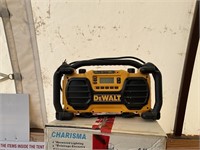 2 Boxes Of Light Fixtures and a Dewalt Radio