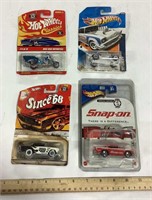4 packaged Hot Wheels cars