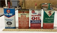 4 oil cans, super oil - 1/2 full, 3-in-one - 1/2