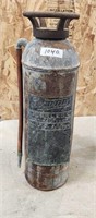 Vintage fire extinguisher w damage