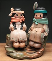 Ceramic Native American Couple Sitting on Rocks