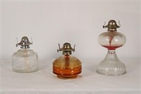 TRIO OF ORNATE GLASS OIL LAMPS