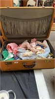 Baby doll clothes and suitcase