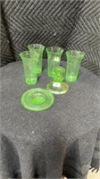 Green glasses and candlestick