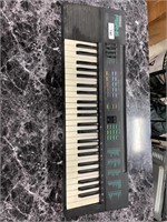 Retro Yamaha PSR-6 Keyboard.