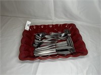 Large serving dish with flatware