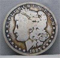 1887-O Morgan Silver Dollar.