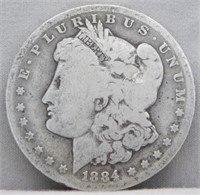 1884-O Morgan Silver Dollar.