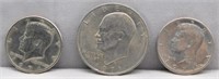 Eisenhower Dollar and (2) Kennedy Halves,