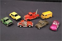Seven Small Scale Die Cast Model Toys