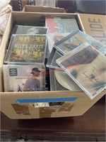 Large box lot of CD’s (living room under table)