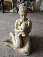 Plastic mother and child statue