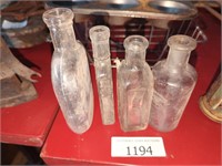 4 vintage glass bottles