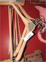 Seven old wooden hangers