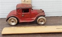 Vintage cast iron red sedan. Stamped 113 L
