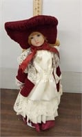 Vintage porcelain doll. 13in tall
