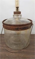 Antique glass kerosene jug by Cleveland Metal