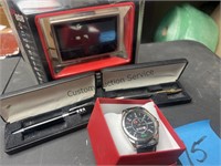 VW watch, 2 pens and music/video player