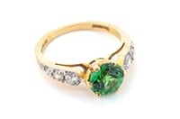 14K Gold Ring w/ Green and White Stones.